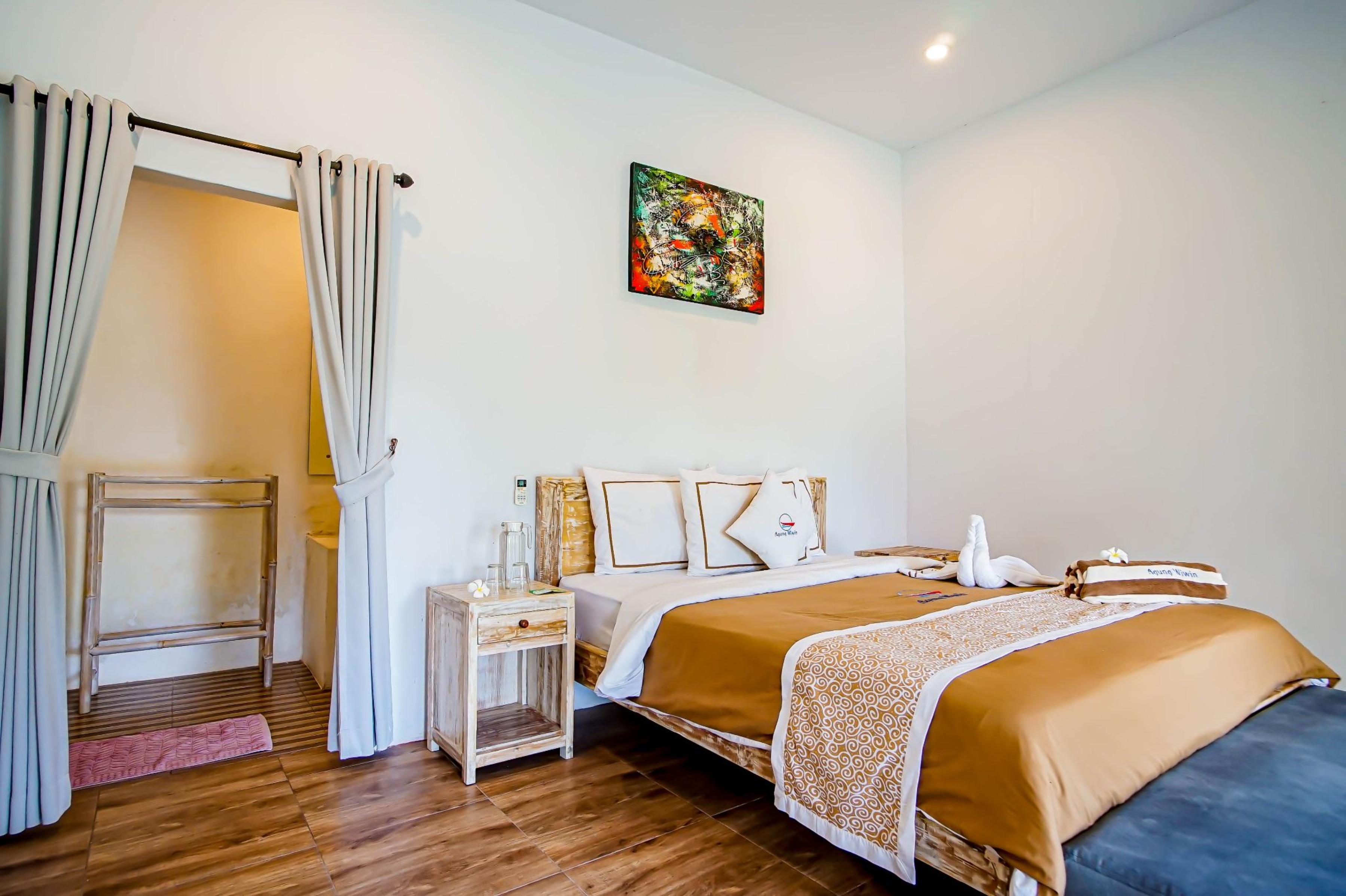 Agung Wiwin Homestay & Restaurant Mengwi Bagian luar foto