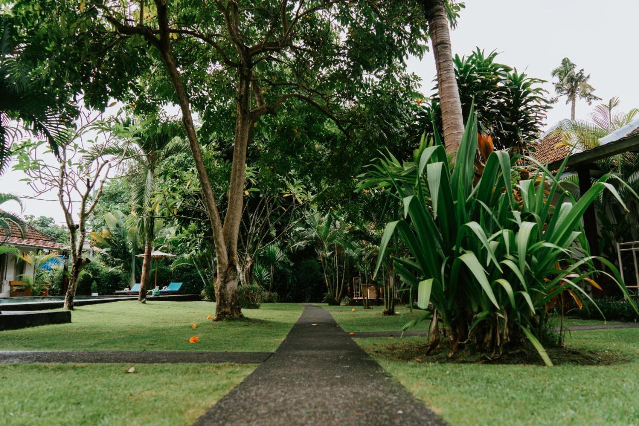 Agung Wiwin Homestay & Restaurant Mengwi Bagian luar foto