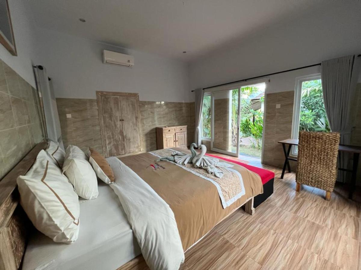 Agung Wiwin Homestay & Restaurant Mengwi Bagian luar foto