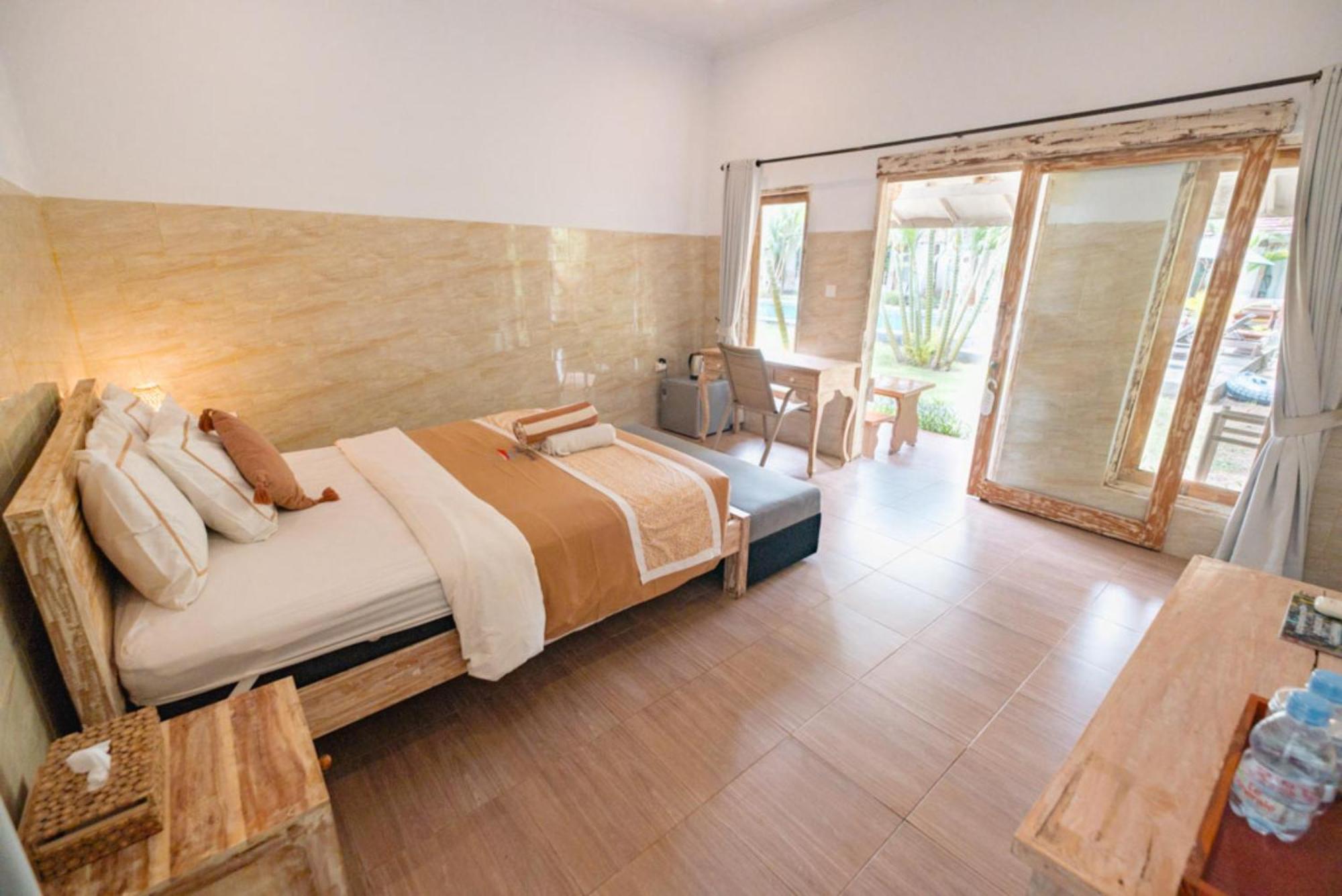 Agung Wiwin Homestay & Restaurant Mengwi Bagian luar foto