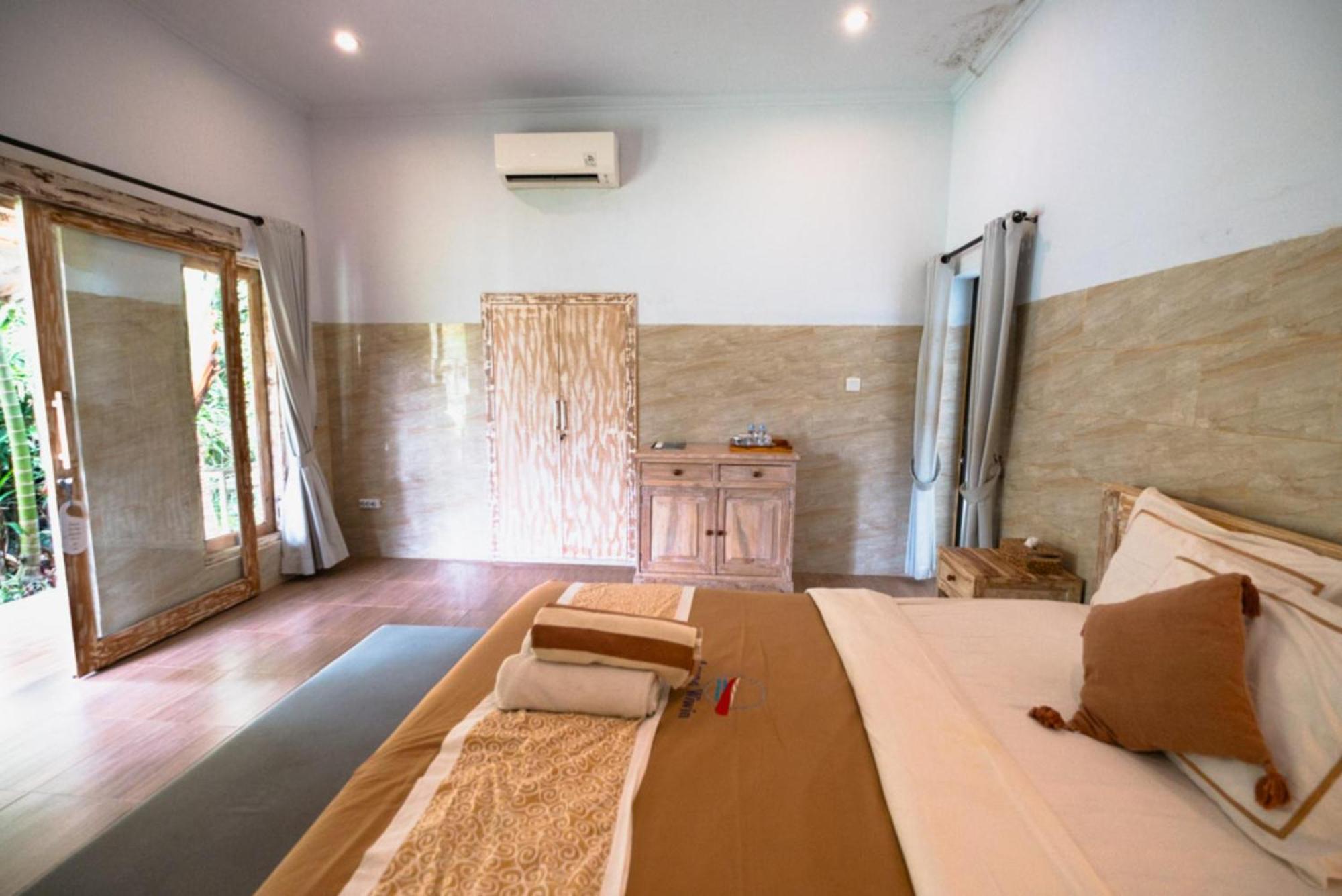 Agung Wiwin Homestay & Restaurant Mengwi Bagian luar foto